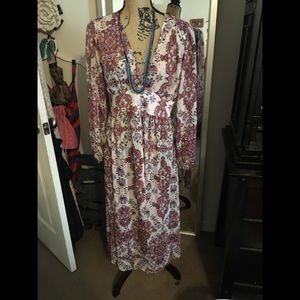 Sheer floral duster perfect over a bodycon dress.